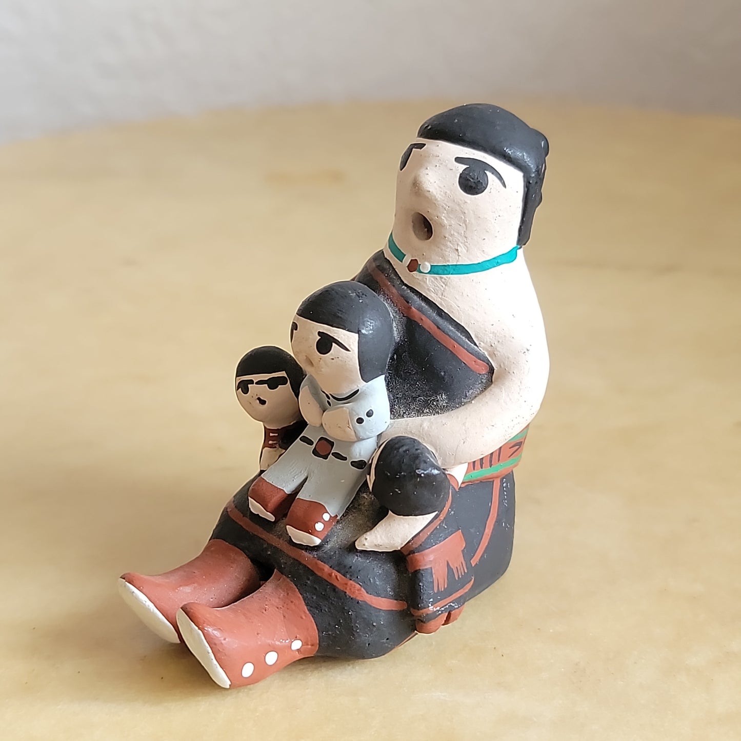 Robert Tenorio Santo Domingo Pueblo Pottery Storyteller w/ three babies