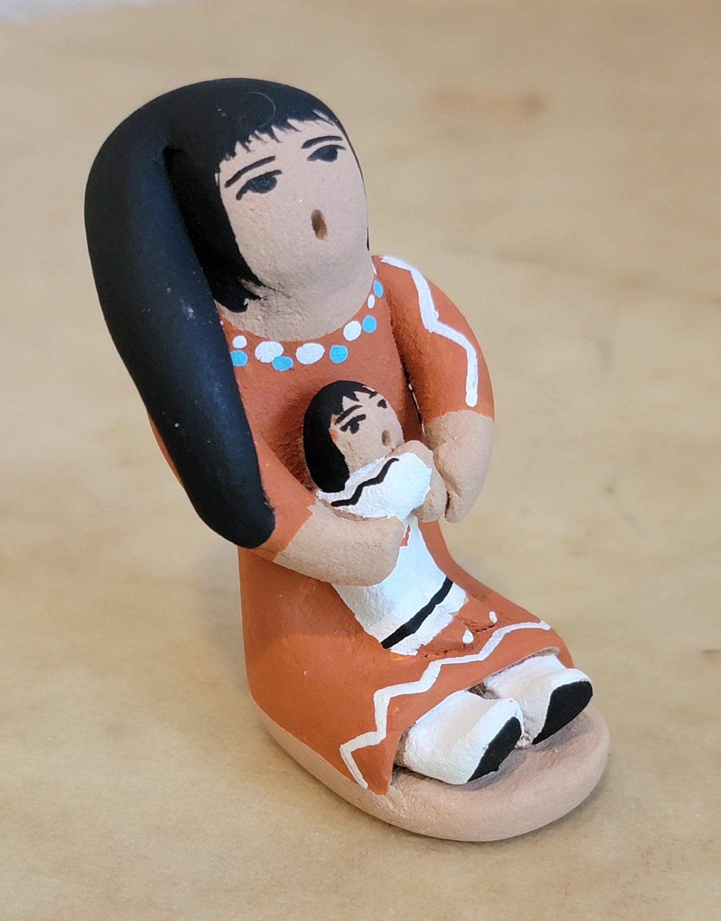Angie Loretta Jemez Storyteller w/ One Child Pueblo Pottery