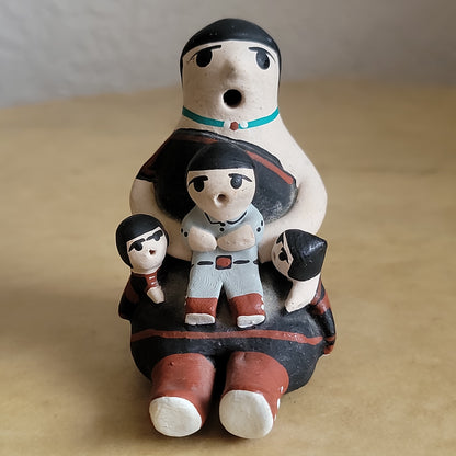 Robert Tenorio Santo Domingo Pueblo Pottery Storyteller w/ three babies