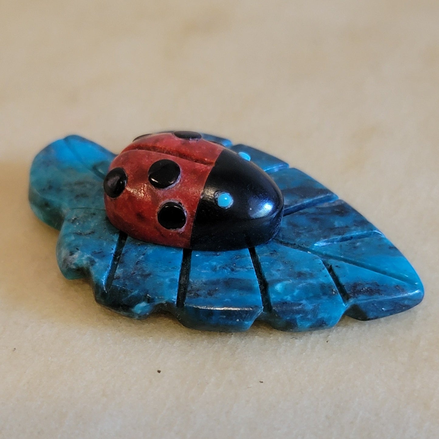 Reynold Lunasee Colorful Ladybug on Chrysocolla Leaf Zuni Fetish