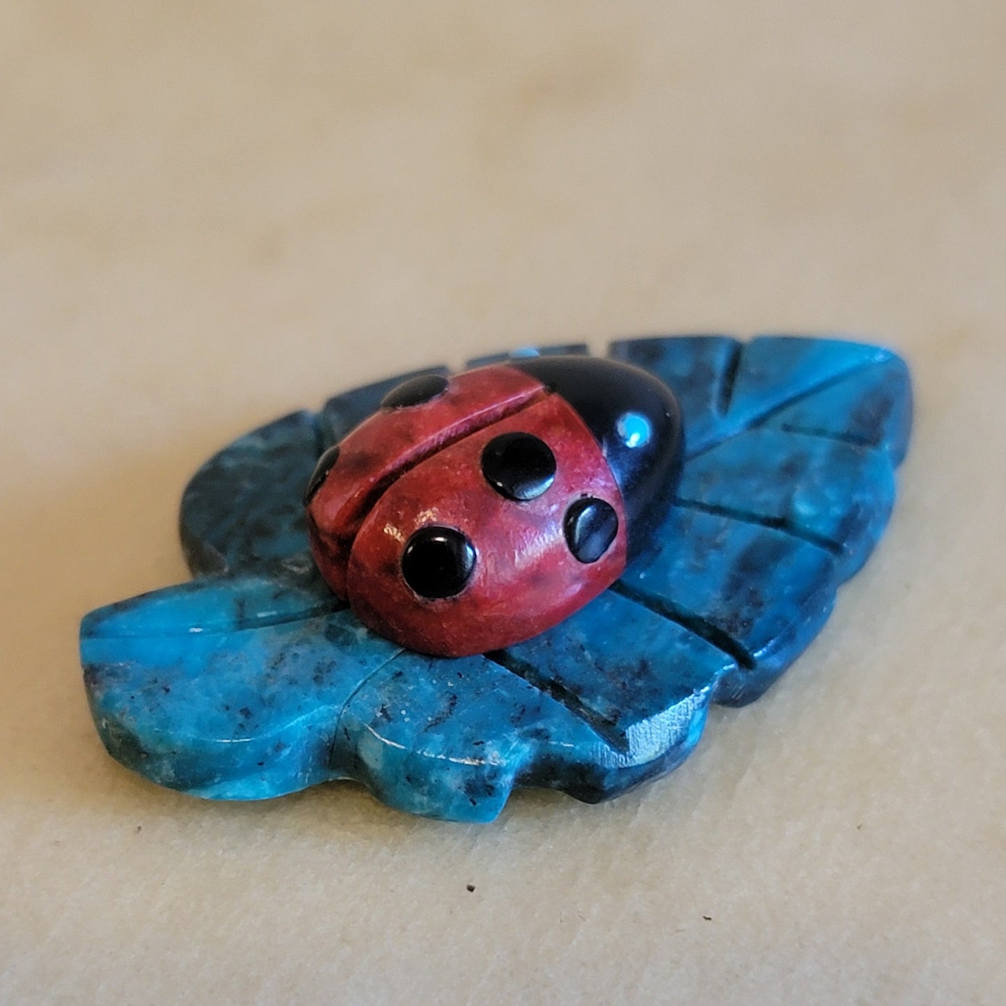 Reynold Lunasee Colorful Ladybug on Chrysocolla Leaf Zuni Fetish