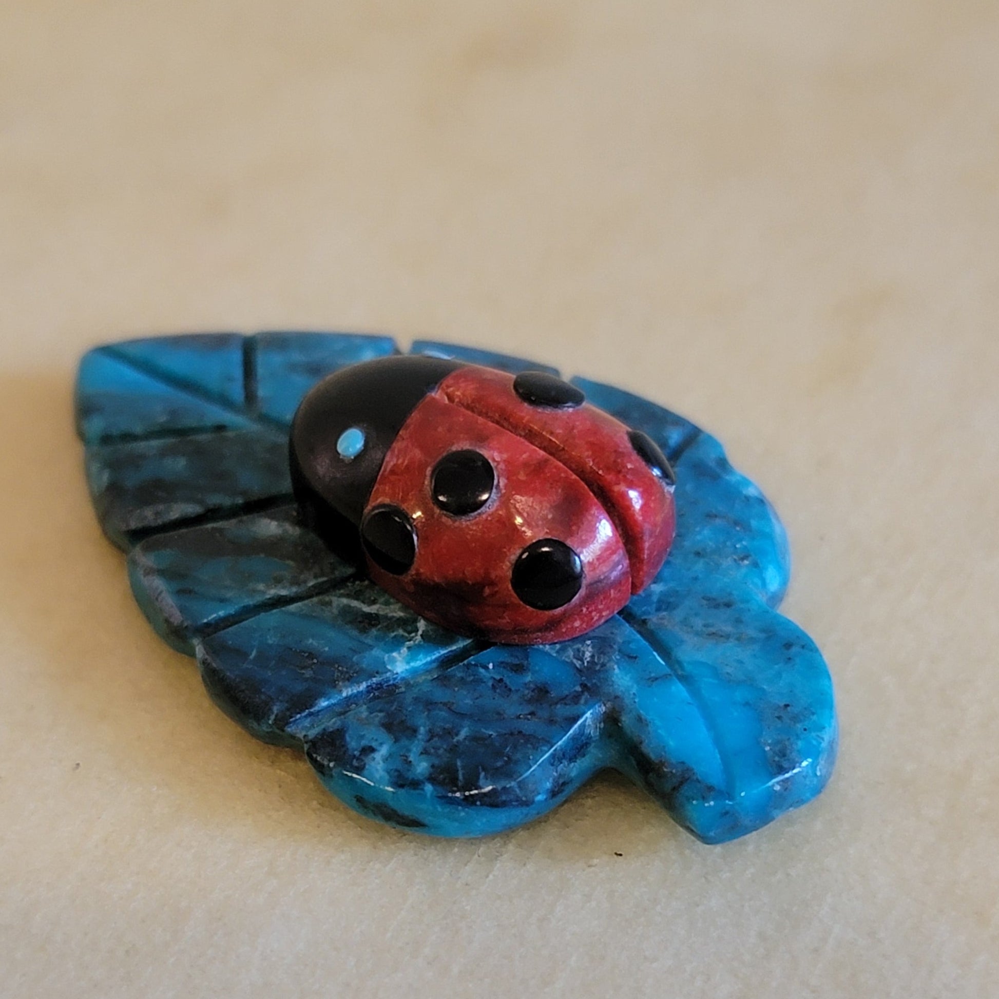 Reynold Lunasee Colorful Ladybug on Chrysocolla Leaf Zuni Fetish