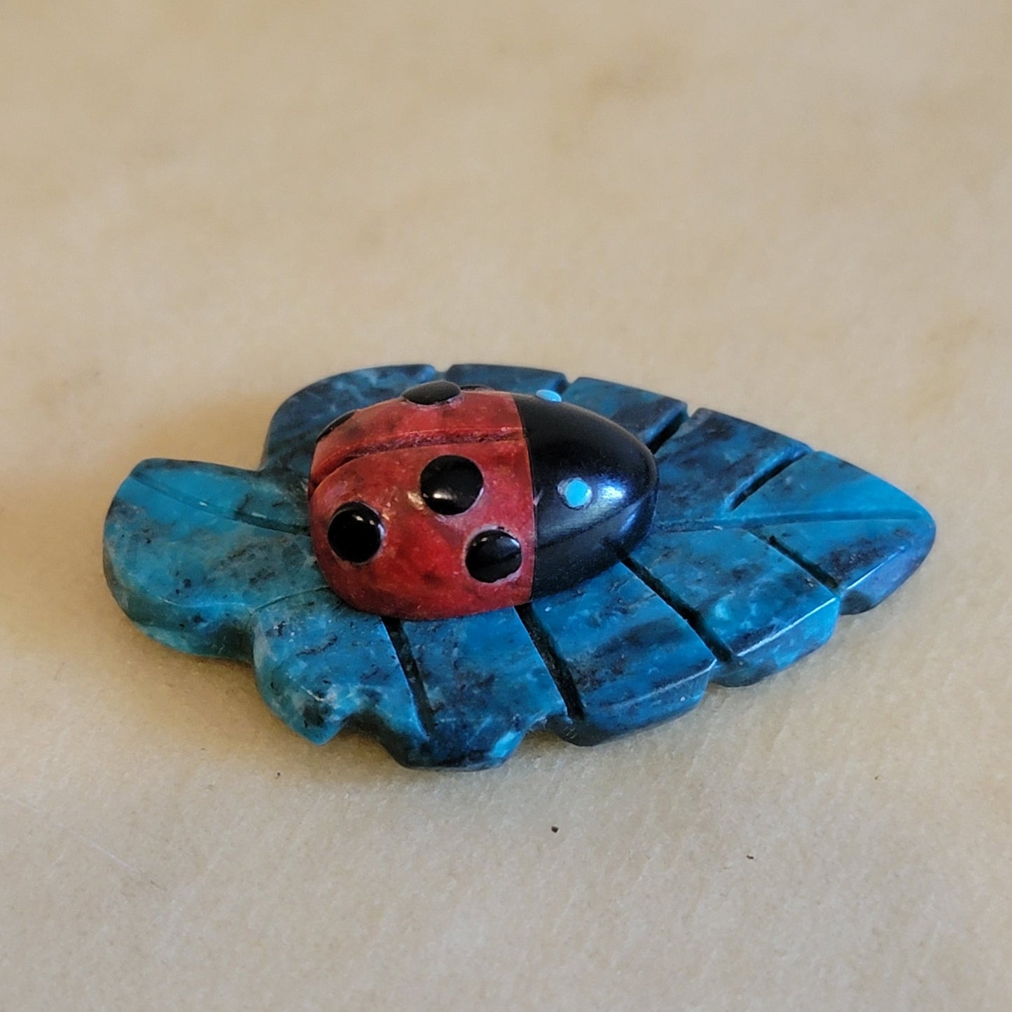 Reynold Lunasee Colorful Ladybug on Chrysocolla Leaf Zuni Fetish