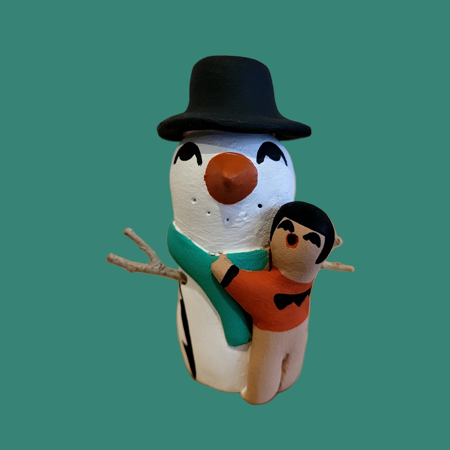 Jemez Pueblo Potter Snowman Stoyteller w/one Hugging Child