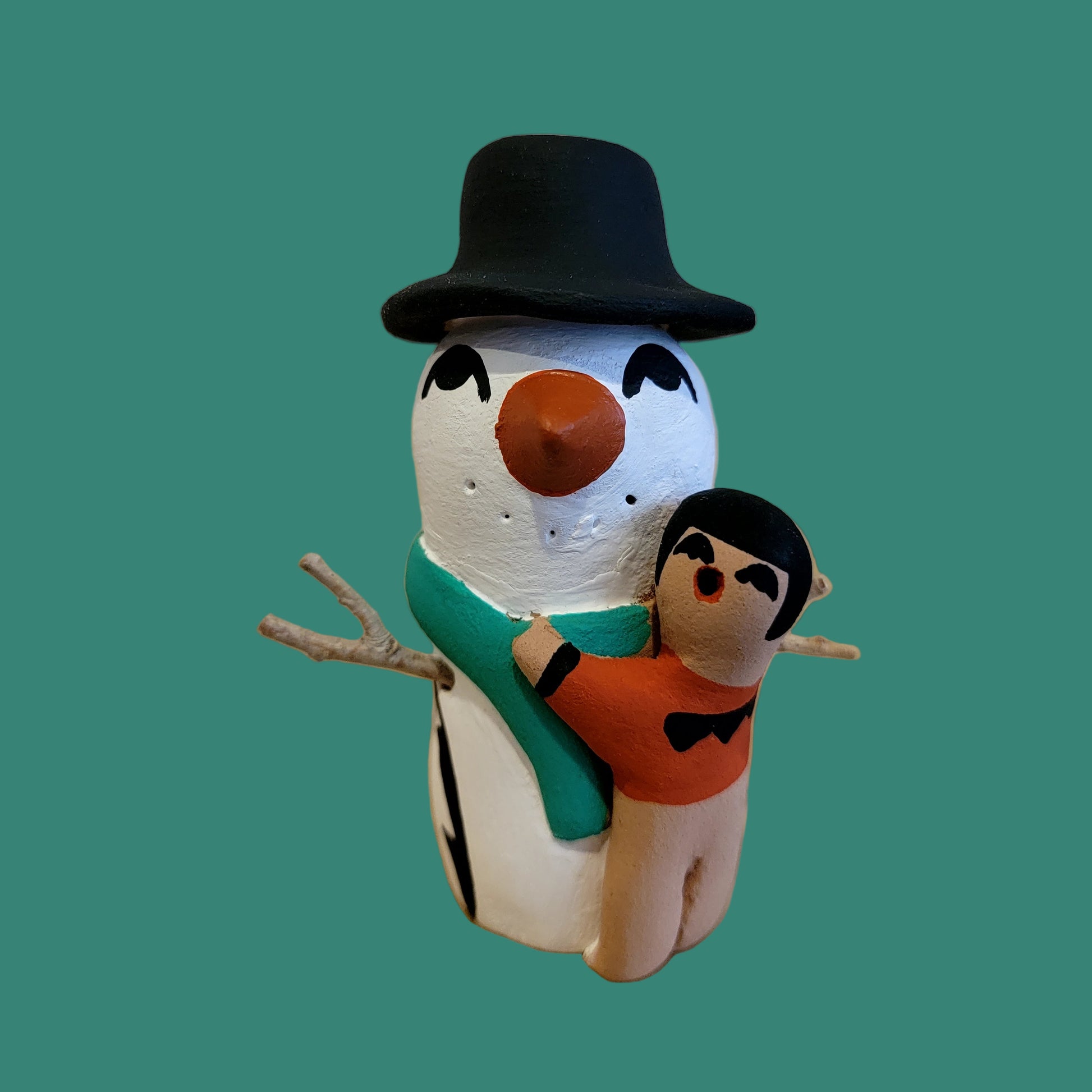 Jemez Pueblo Potter Snowman Stoyteller w/one Hugging Child