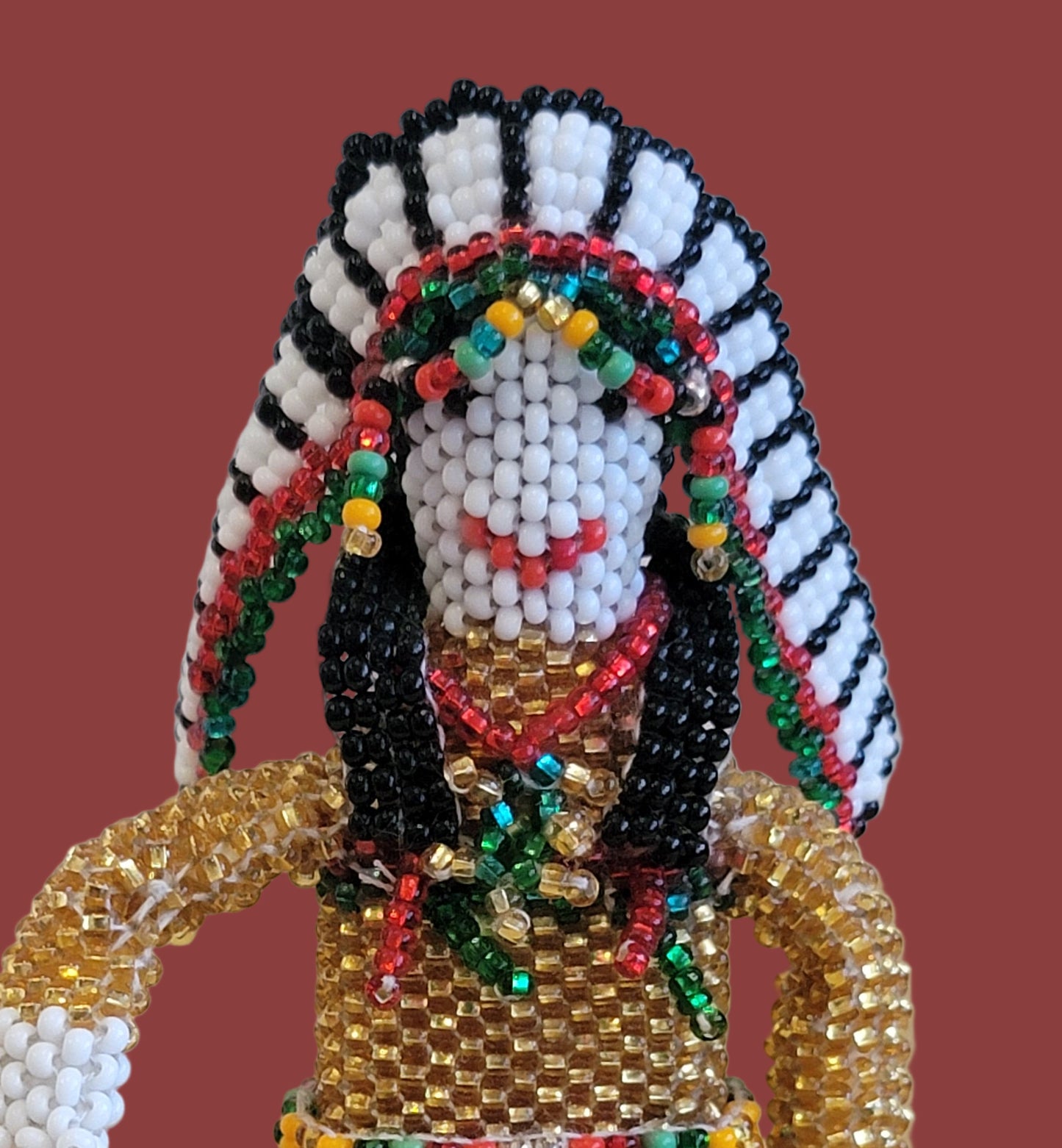 Zuni Fully Beaded Chief is Holiday Ready and Holding a Ceremonial Fan Indian Beadwork