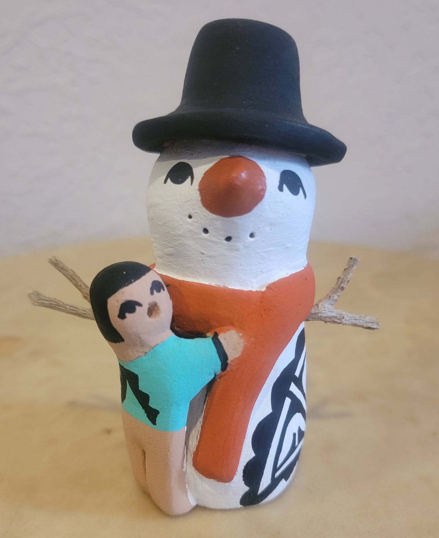 Snowman w/One Child Jemez Pueblo Pottery Storyteller