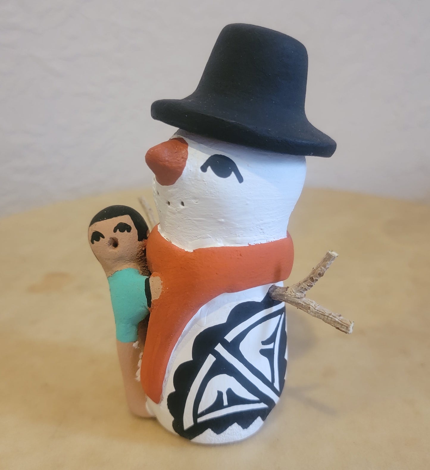 Snowman w/One Child Jemez Pueblo Pottery Storyteller