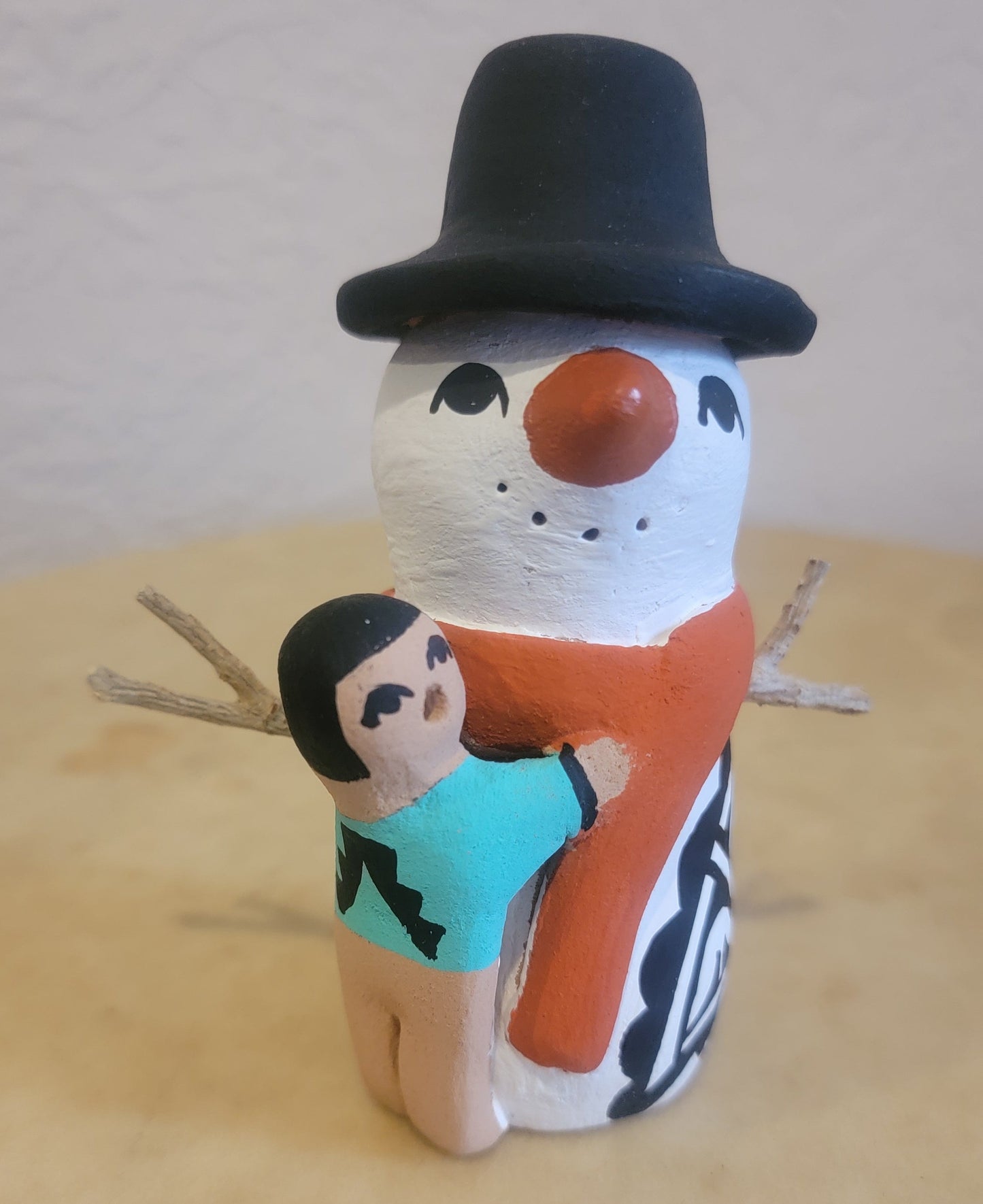 Snowman w/One Child Jemez Pueblo Pottery Storyteller