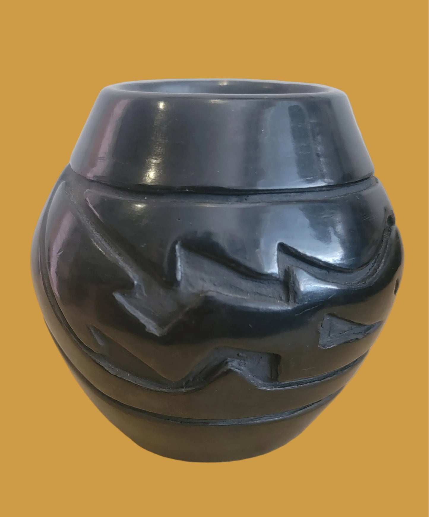 Carved Santa Clara Pueblo Blackware Pottery W/ Avanyu Design