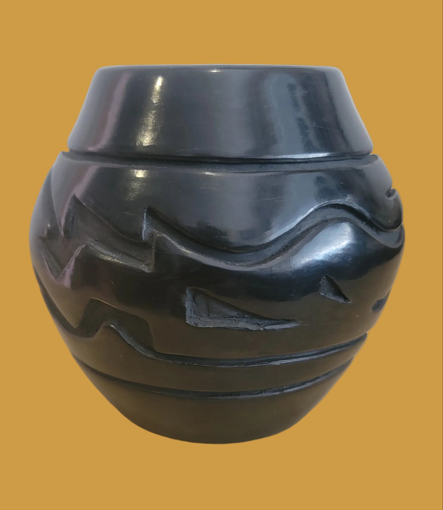 Carved Santa Clara Pueblo Blackware Pottery W/ Avanyu Design