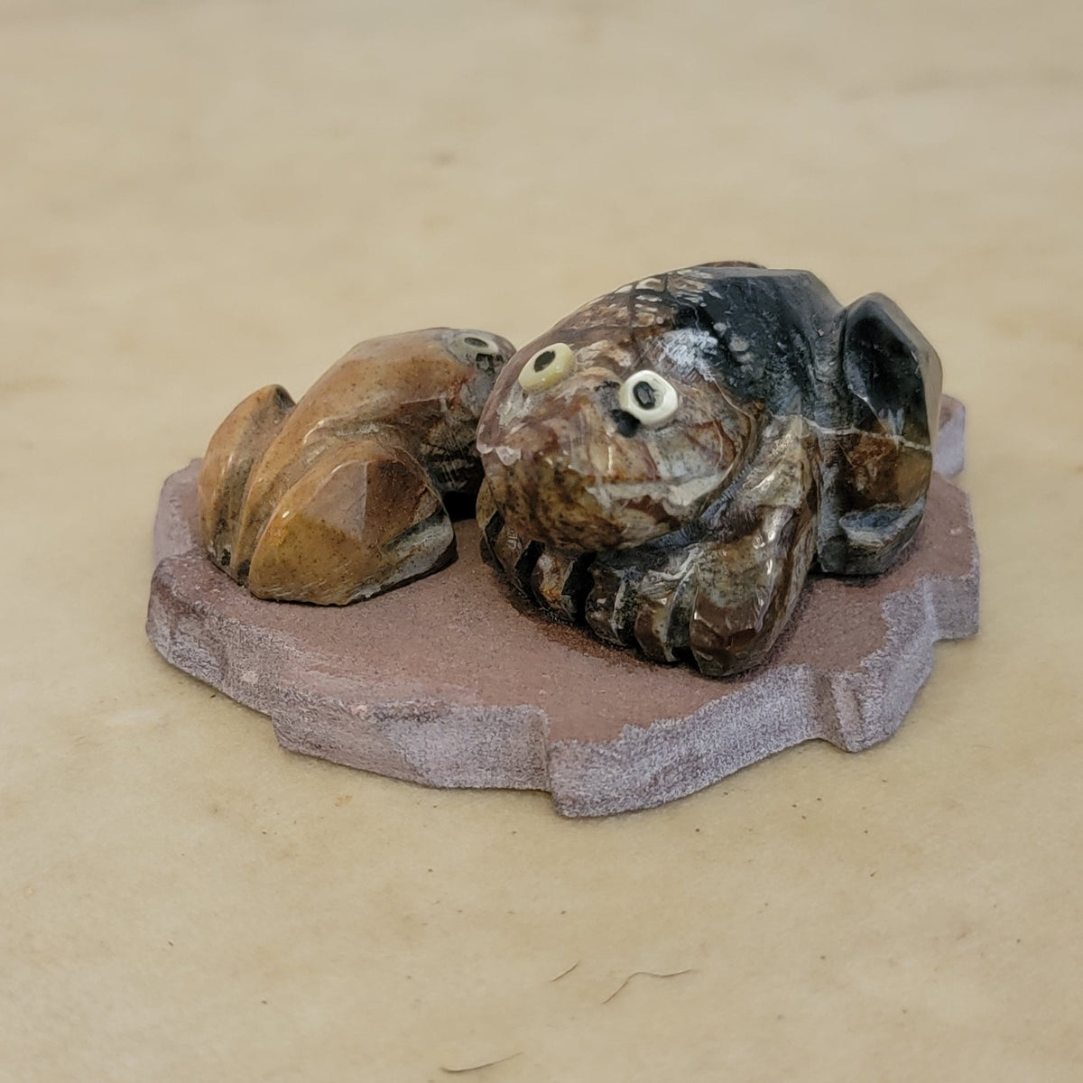 Double Picasso Marble Frogs Lounging on Sandstone Leaf Zuni Fetish
