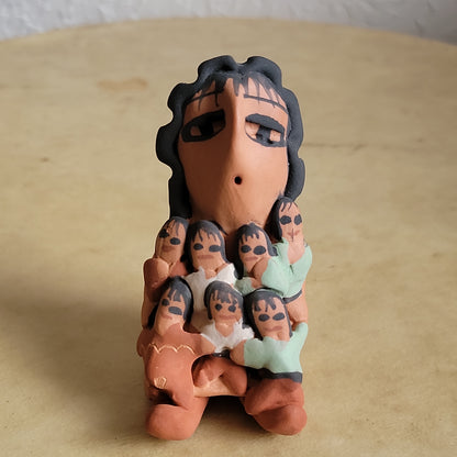 Eva Plummer Navajo Pottery Storyteller w/ Seven Babies