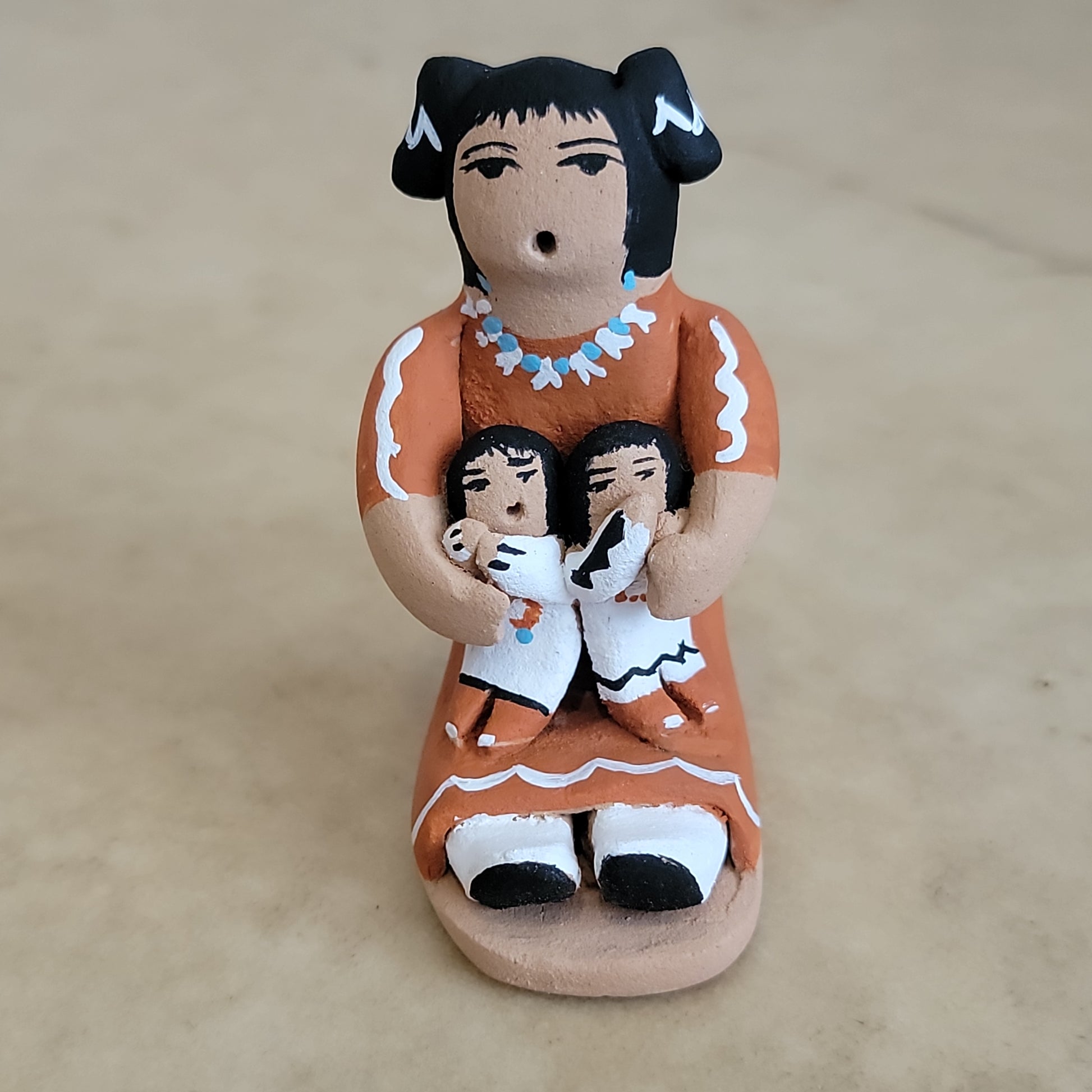 Angie Loretto Jemez Pueblo Pottery Storyteller w/two babies